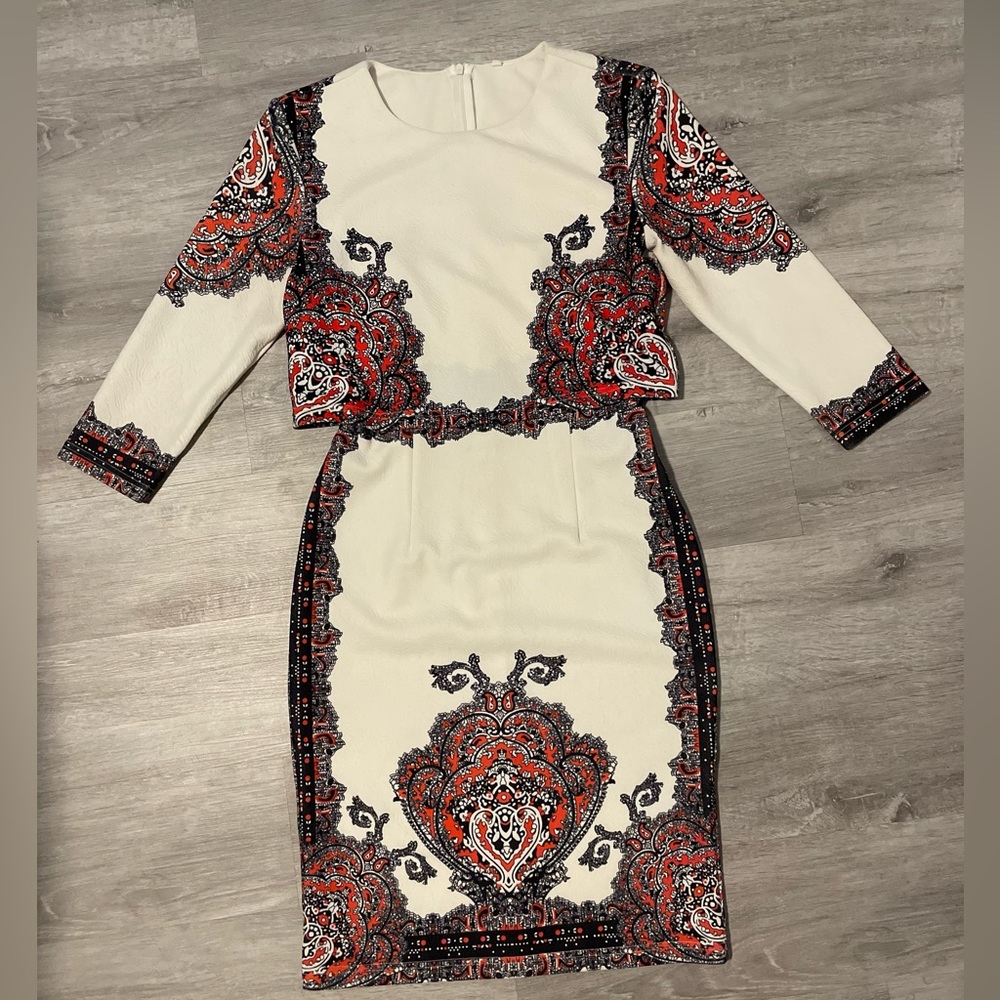White, black, Red full dress. One piece. Small rinds a bit larger